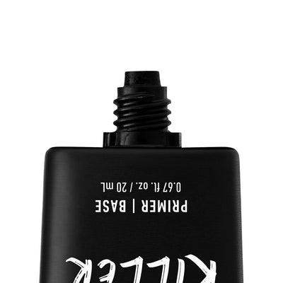 Black cosmetic bottle with white text on a white background